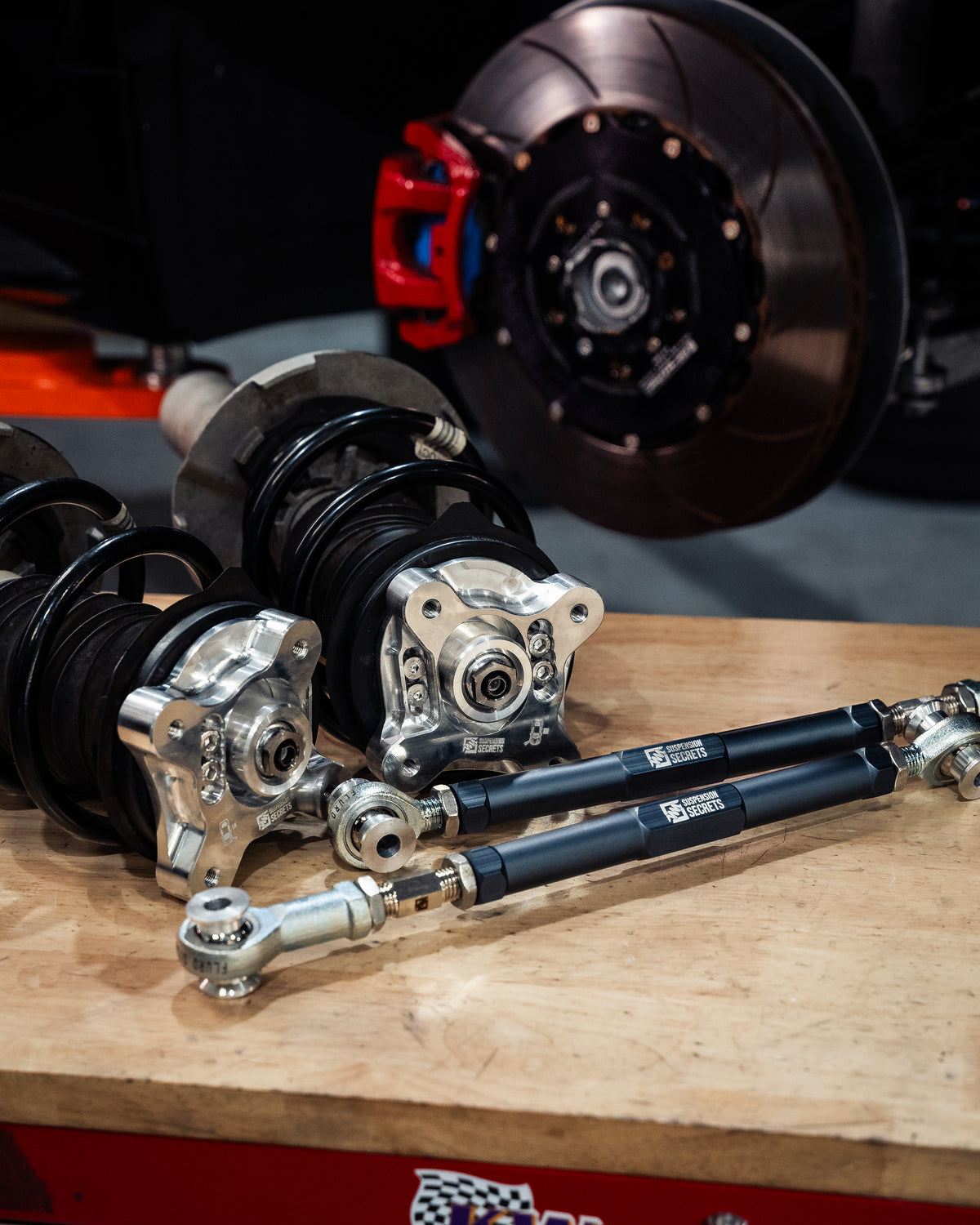 Suspension Secrets components on a workbench